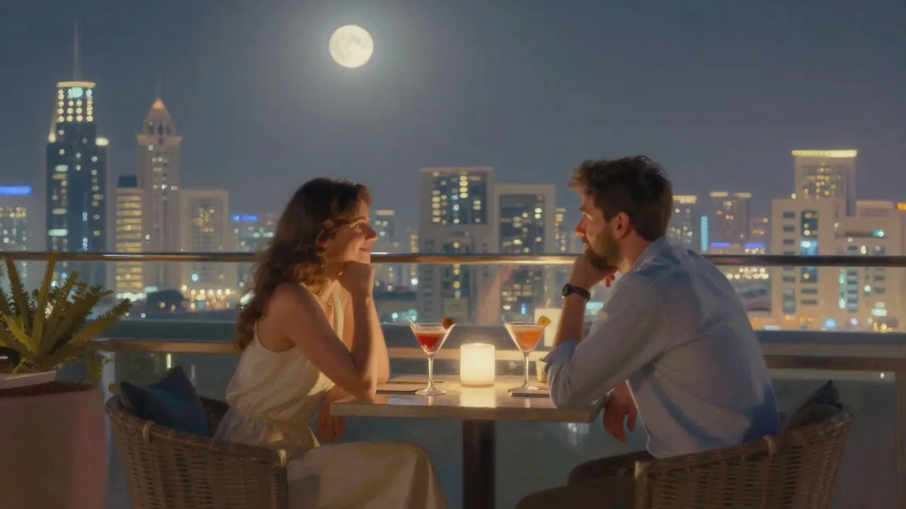 A couple sits quietly on a Dubai rooftop lounge at night, enjoying the skyline with restrained, respectful body language.